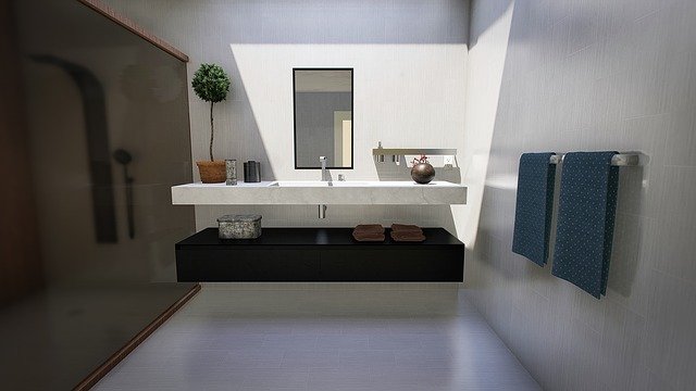 Bagno ristrutturato in provincia di Varese con stile moderno by Tozzi Style.